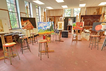 Painting Studio with easels and paintings