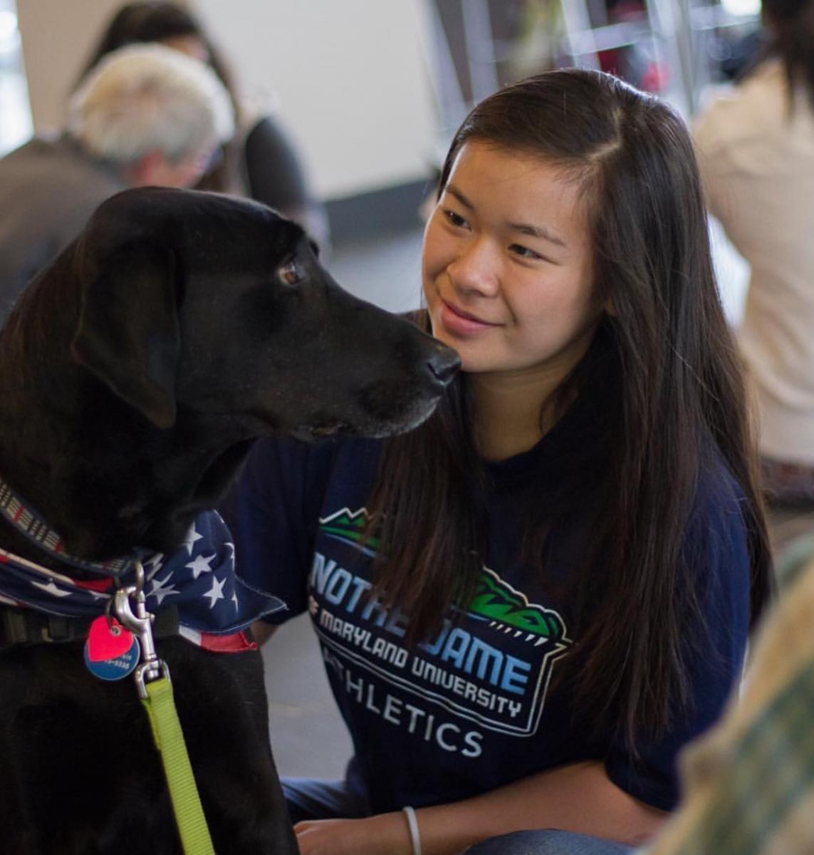 therapy dog with student