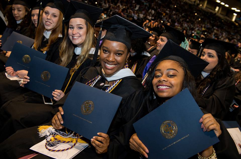 Commencement 2018 - students with diplomas