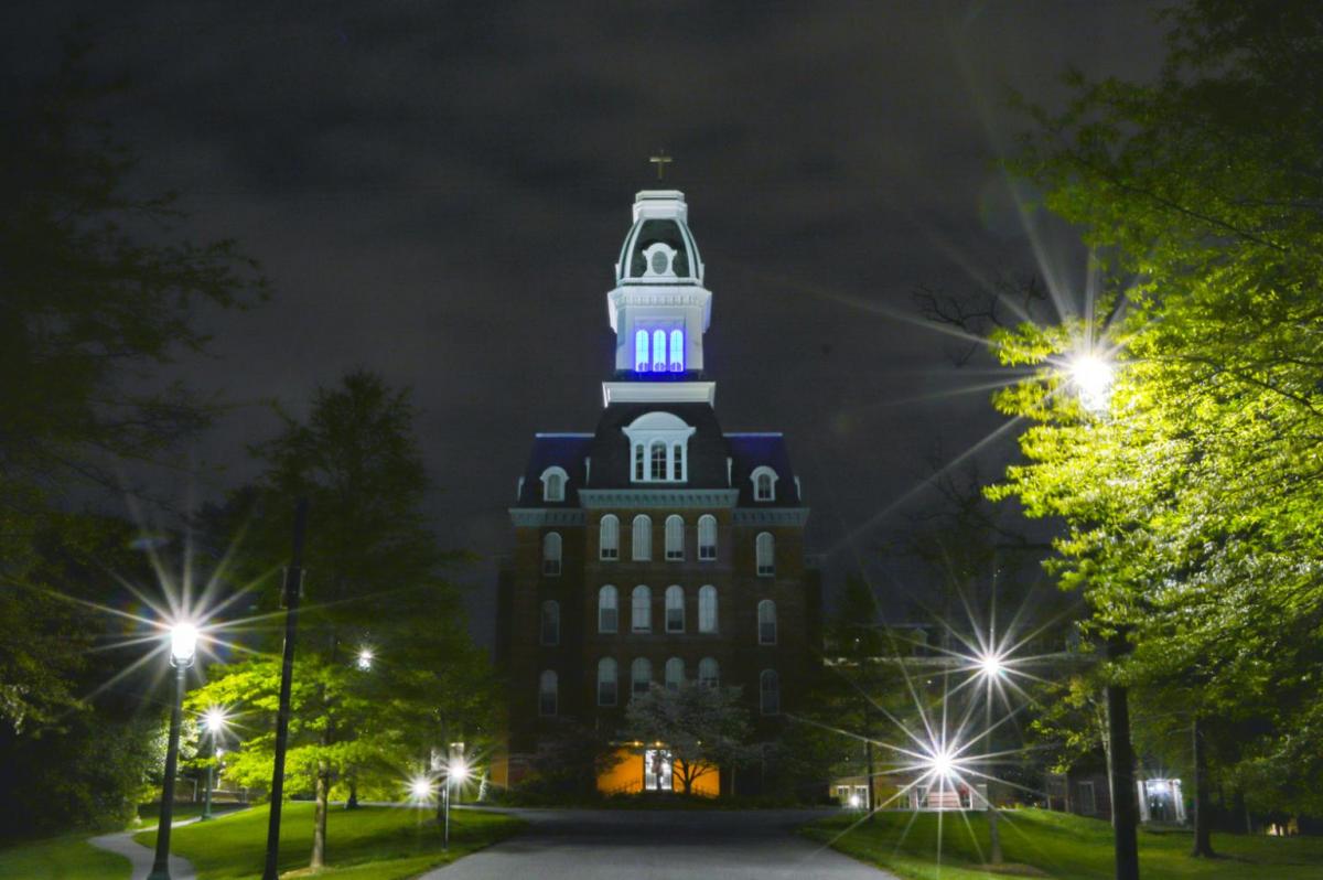 gibbons tower at night glowing blue