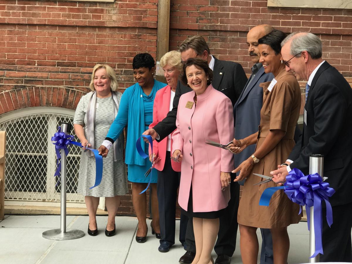 Dignitaries at Gibbons ribbon cutting