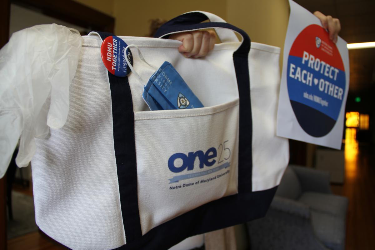 125 years tote bag with ppe inside