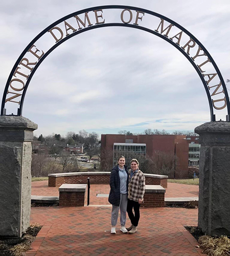 The DeGrange's under NDMU's archway