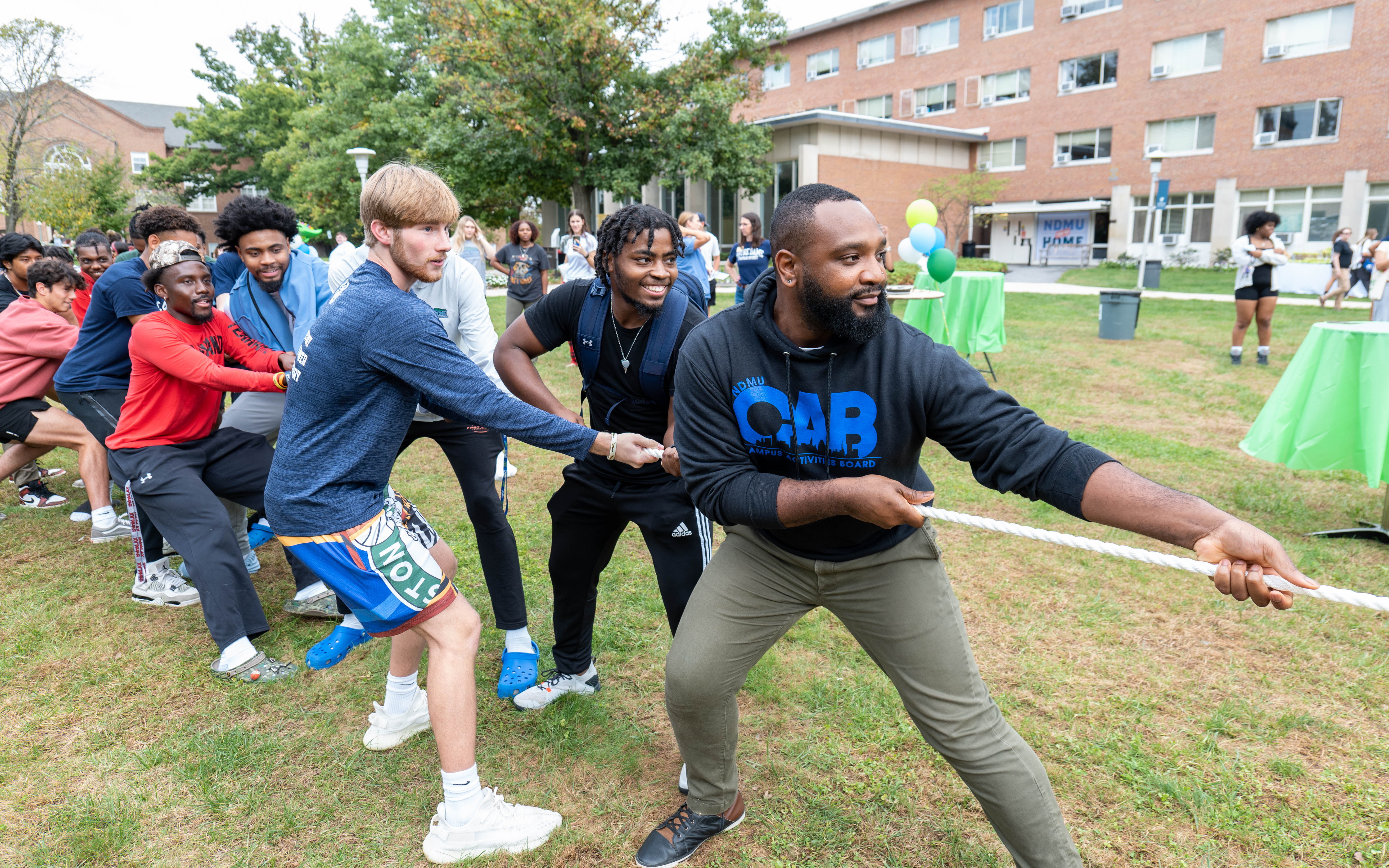 students play tug of war