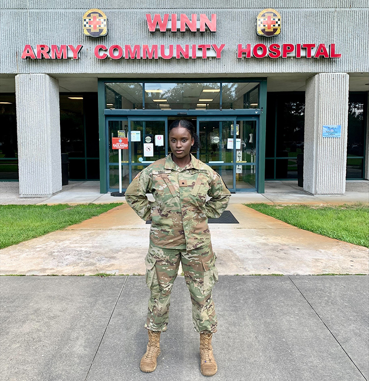 Oumou Sall in front of the Winn Army Community Hospital in Georgia
