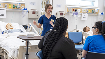 Nursing faculty with Caroline Center members