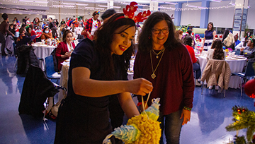 Students, staff and faculty at the Christmas Dinner