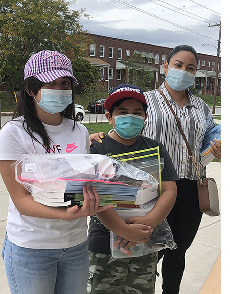 Local students pose with their supplies