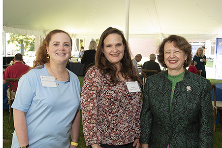 two alums with president yam