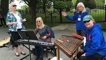 Renaissance Institute members at an outdoor music course