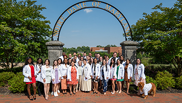 SOP Class of 2025 at the NDMU archway