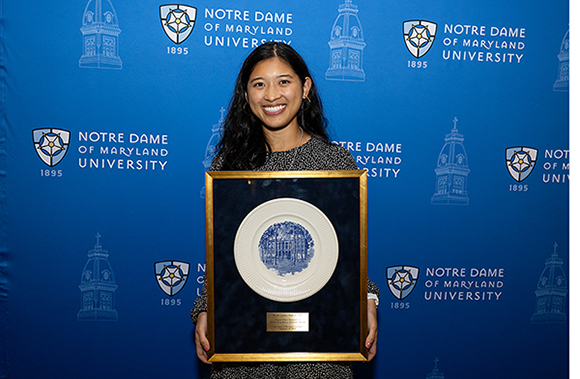 Micah Castelo with Regina Russo Hammel '41 Outstanding Recent Graduate Award