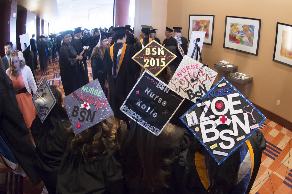 Students gathering for commencement 2015