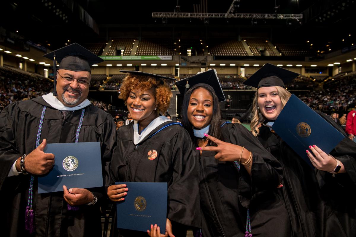 new graduates celebrate