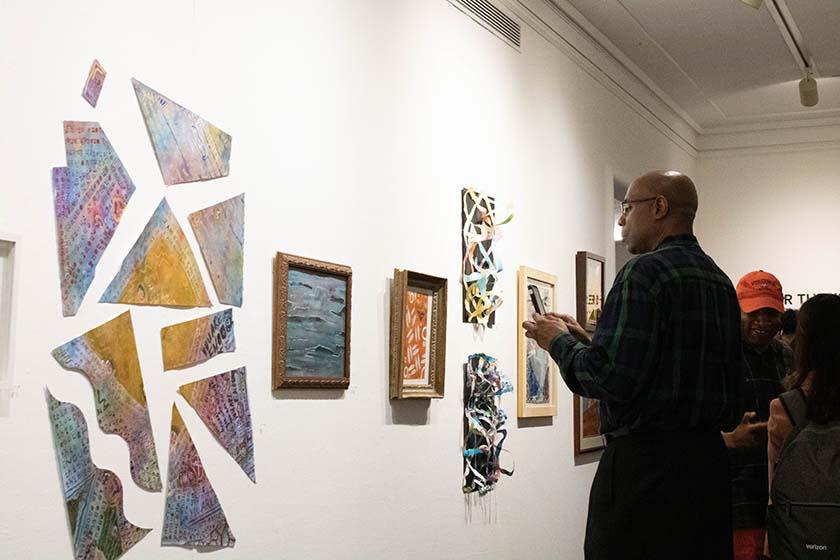 person observing the artwork