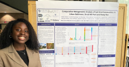 Female student presenting her poster