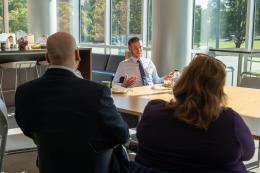 Jason Steidl Jack meets with faculty