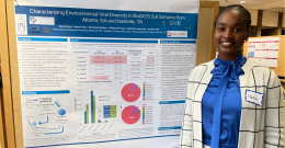 Female student presents her poster