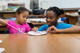 two kids doing handcrafting