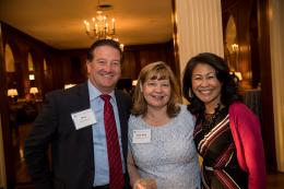 Three guests smile for the camera