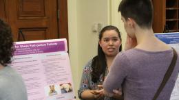 two students at poster