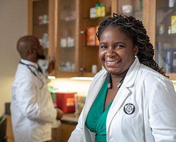 two pharmacy students in lab