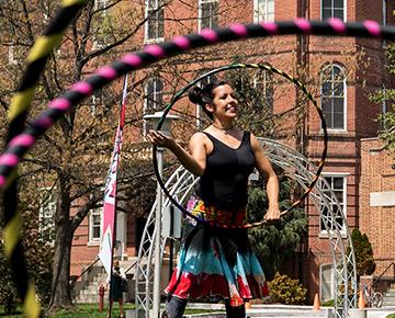 a woman playing a hula hoop