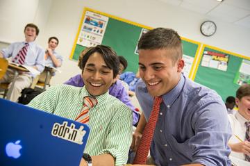 Student and Teacher discussing