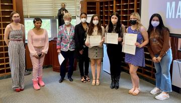 A group photo of NDMU students who earned IMPRINT badges in 2021-22.