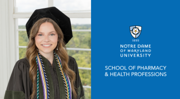 Madison Heyman posing in cap, gown and cords
