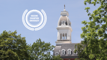 gibbons tower with college challenge seal