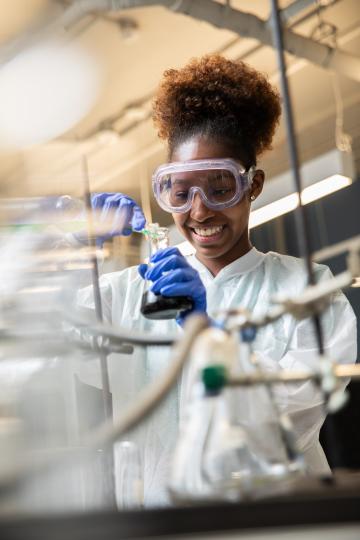 Female student in a science lab