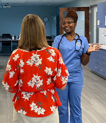 Nursing student being interviewed by a WBAL reporter