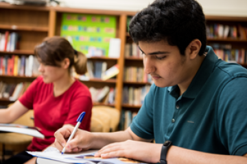 student sitting at desk working