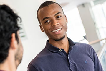 2 students smiling