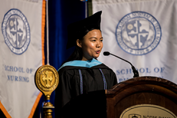 student speaking at commencement