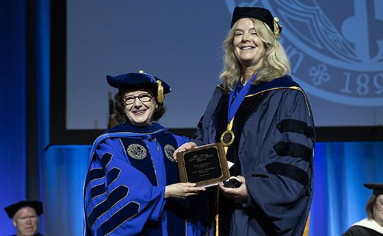 Christa de Kleine receiving the Mullan Award