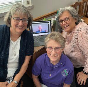 (L. to R.) Sisters Stephanie, Jill (on screen), Carol Jean and Bridget make up the SSND North American Vocation Team.