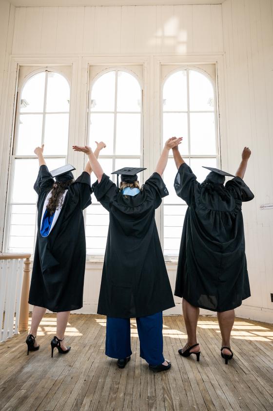 Three students in Caroline Tower