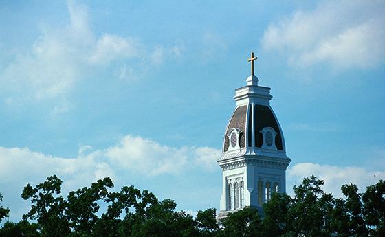 Merrick Tower atop Caroline Hall with the sky in the background