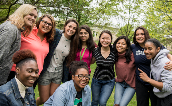diverse group of young women under the trees
