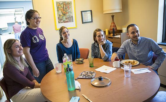 a group of people around a table