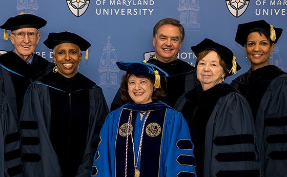 President Yam with Board of Trustees in Commencement garb