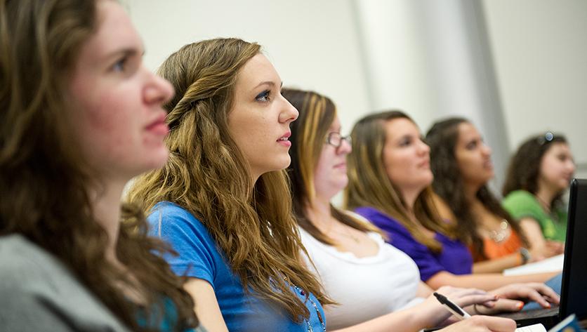 Six female students in a classroom