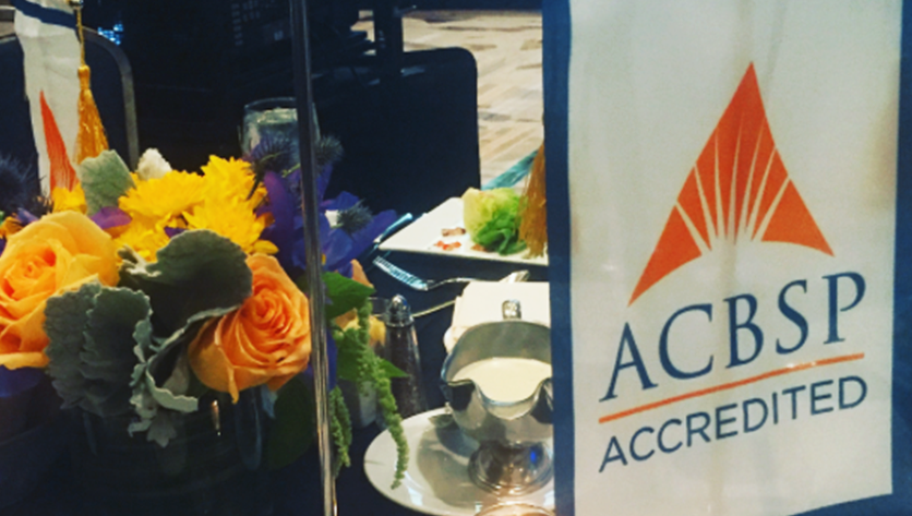 ACBSP Accredited table set up with flowers