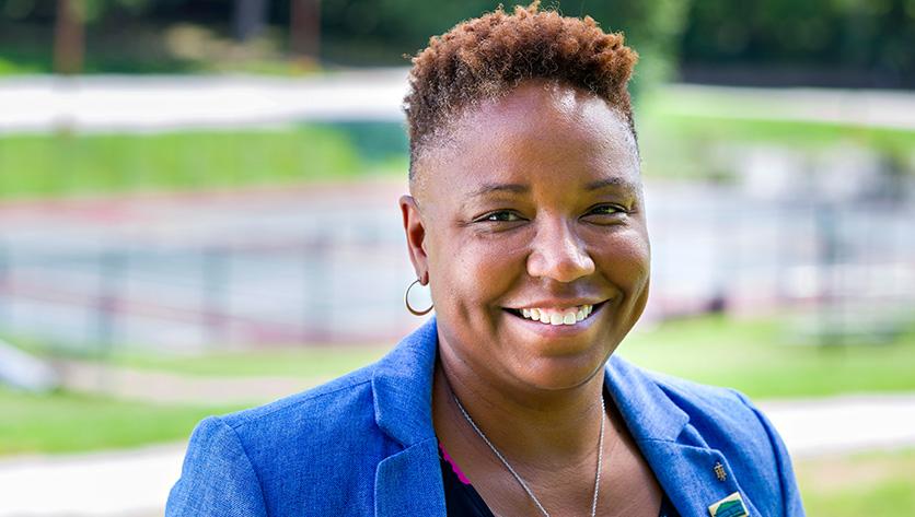 Renee Bostic - Athletic Director - headshot outside smiling