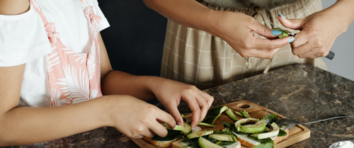 mother and child cooking together