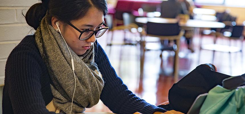 student with headphones in