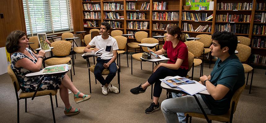 students learning from teacher
