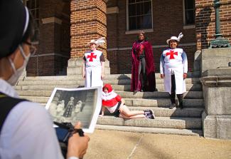 NDMU drama and photography students recreate a photo from the 1920's depiction of "As You Like It"
